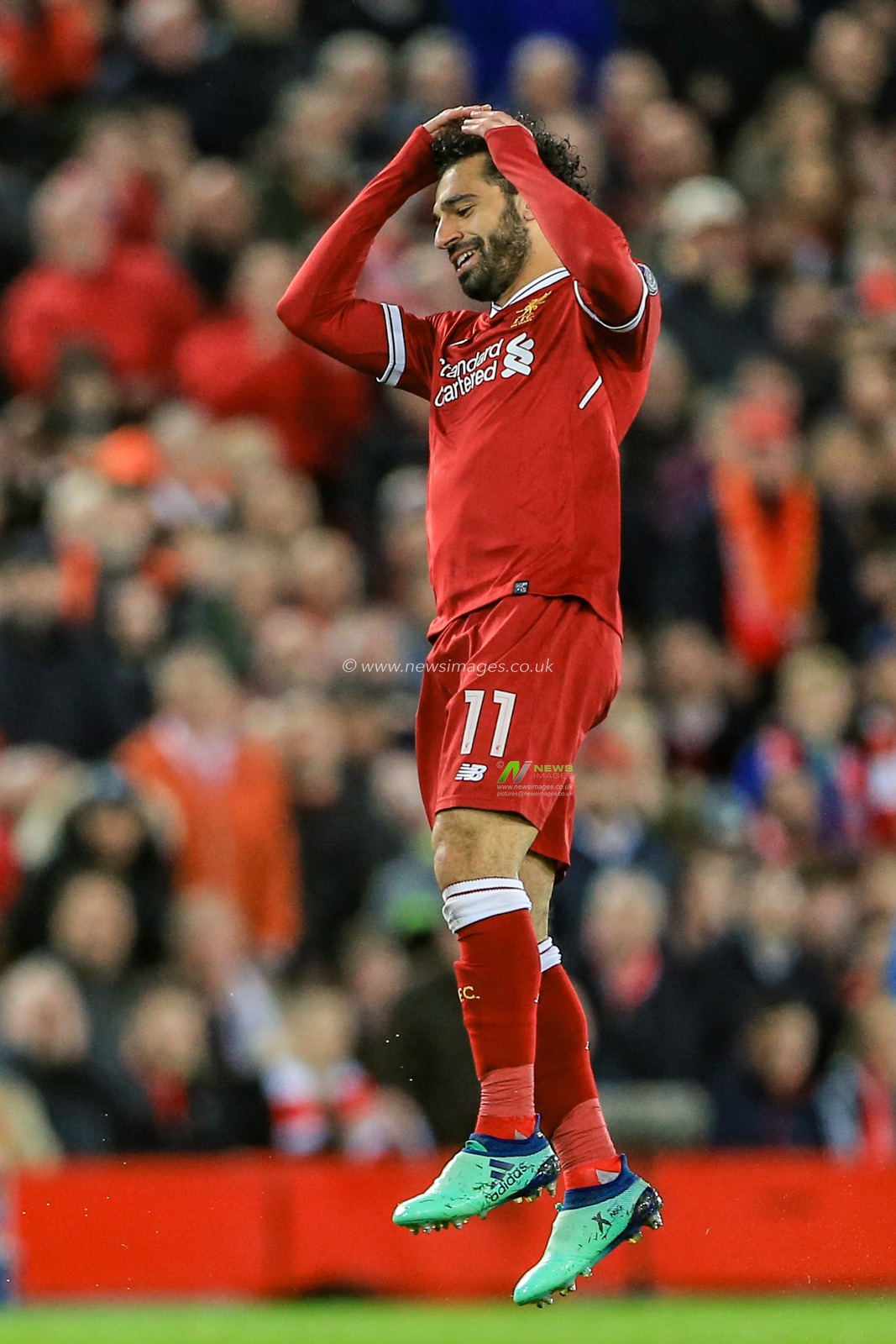 24th April 2018 , Anfield, Liverpool, England; UAFA Champions League Semi Final, first leg, Liverpool v Roma ; Mohamed Salah of Liverpool misses a clear head on goal and shows his frustration