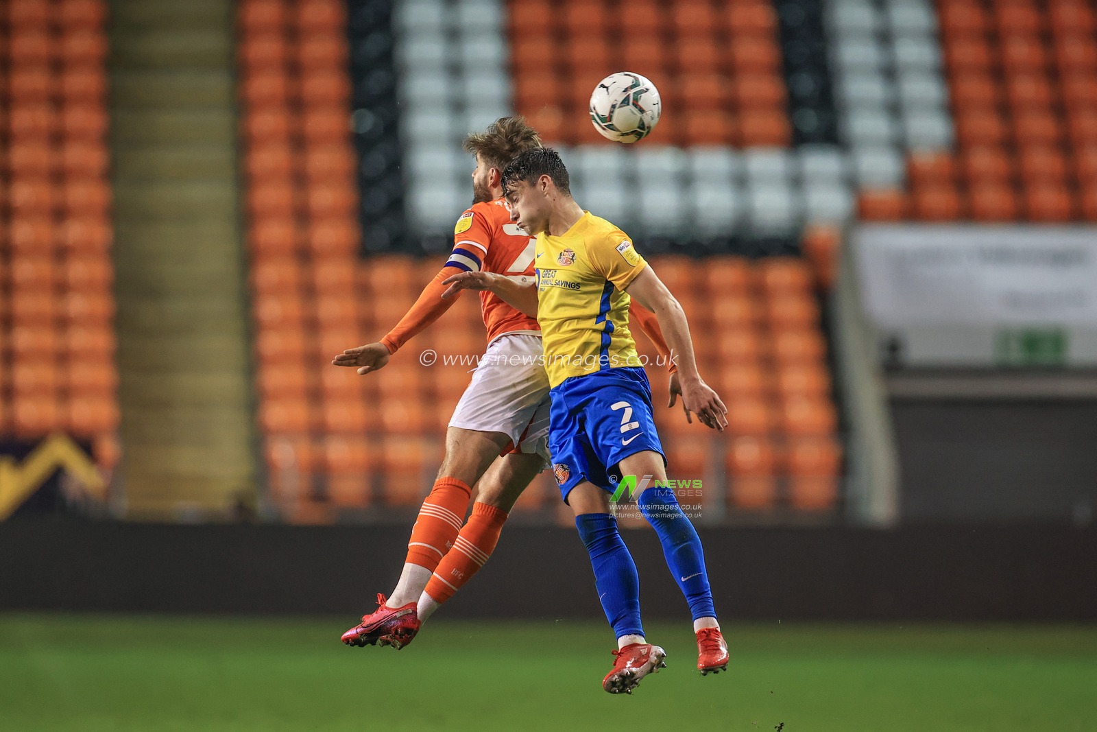 Luke Garbutt #29 of Blackpool and Niall Higgings #2 of Sunderland battle for the ball