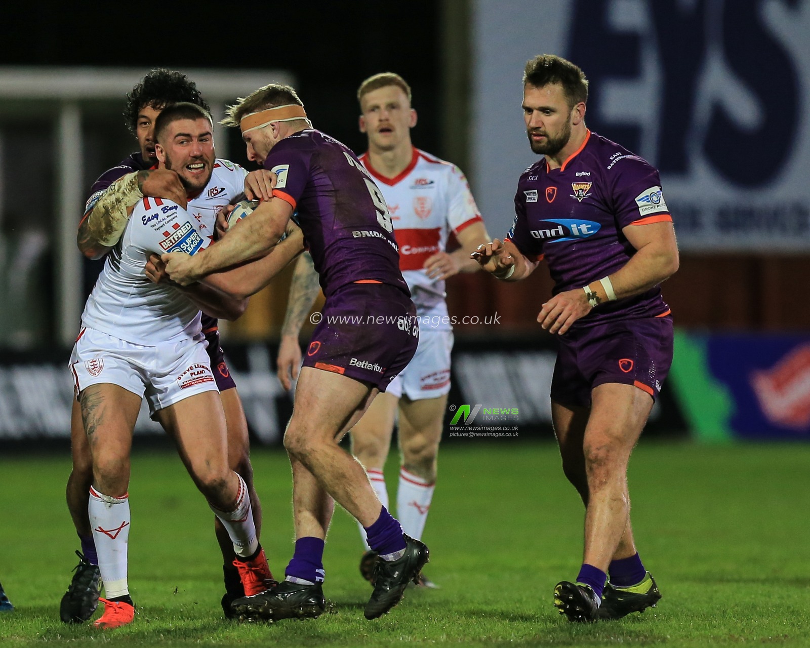 21st February 2020, Hull College Craven Park, Kingston upon Hull, England; Betfred Super League, Hull Kingston Rovers v Huddersfield Giants : Greg Minikin (5) of Hull KR is tackled by the Huddersfield defence