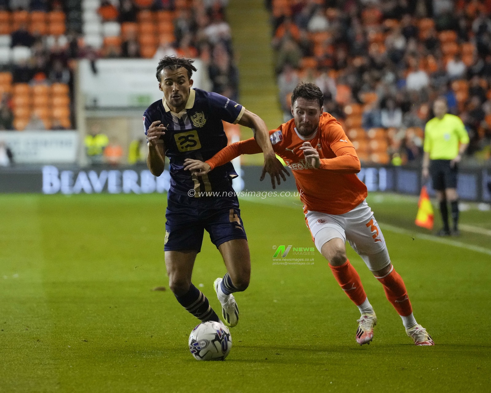 James Husband #3 of Blackpool breaks past Tom Sang #4 of Port Vale during the Sky Bet League 1 match Blackpool vs Port Vale at Bloomfield Road, Blackpool, United Kingdom, 15th August 2023

(Photo by Steve Flynn/News Images)