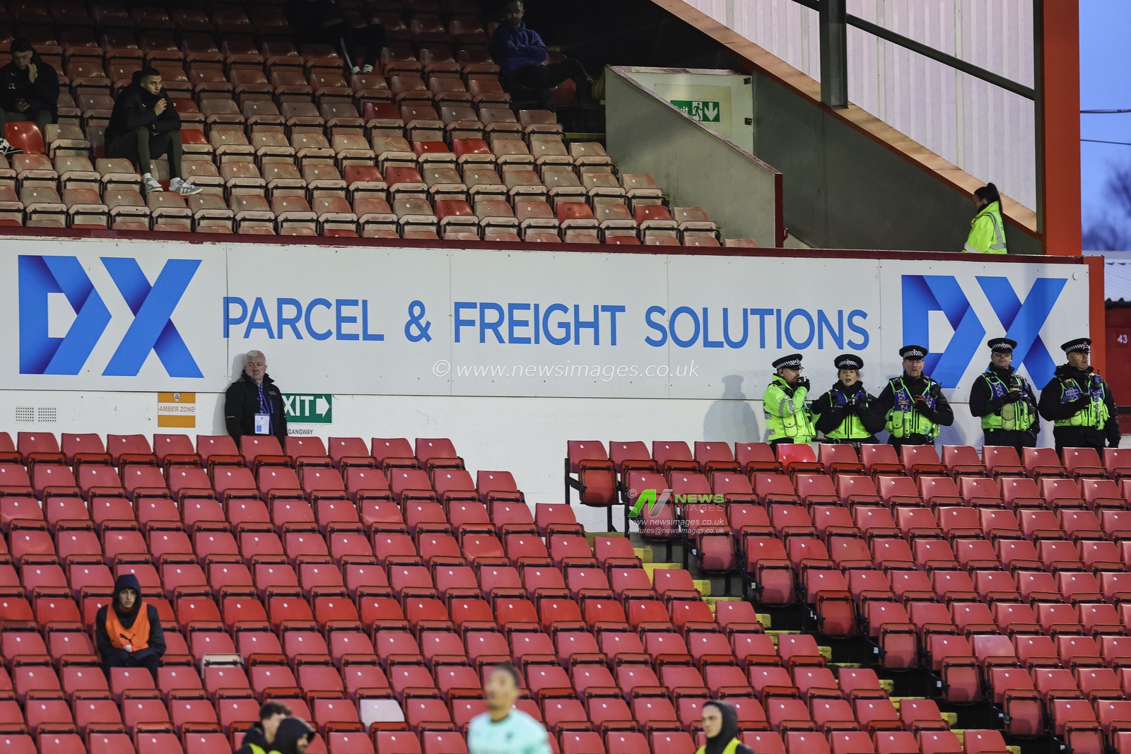 South Yorkshire police look on during the Sky Bet League 1 match Barnsley vs Wigan Athletic at Oakwell, Barnsley, United Kingdom, 1st January 2024

(Photo by Mark Cosgrove/News Images)