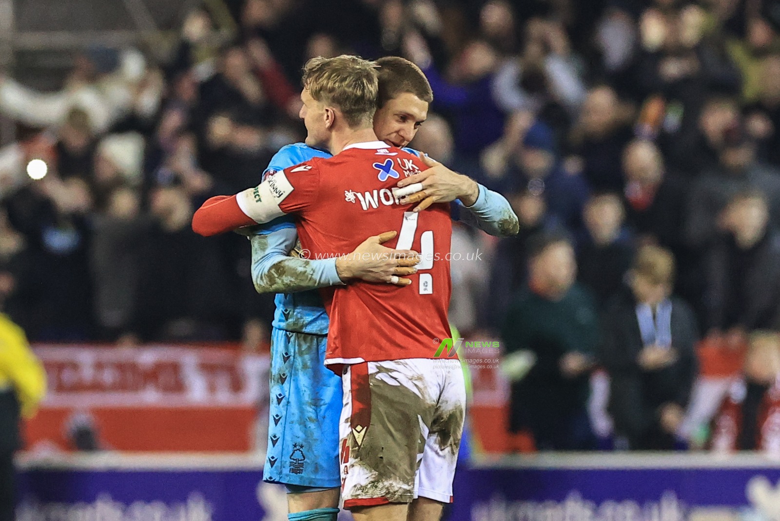 Ethan Horvath #1 of Nottingham Forest and Joe Worrall #4 of Nottingham Forest embrace as Forest win 2-1