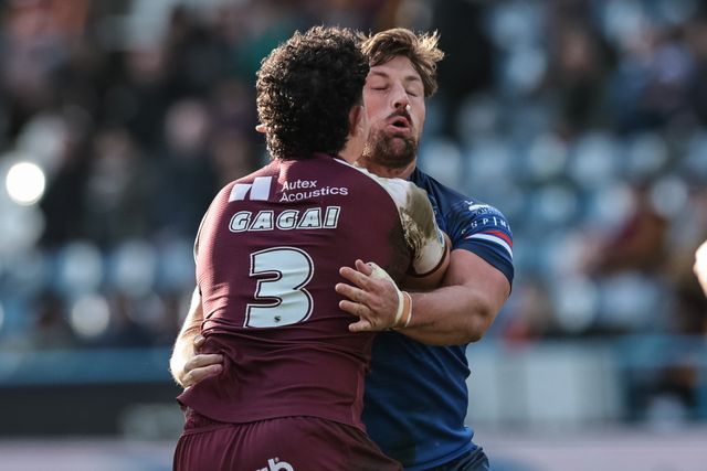Jacob Gagai of Huddersfield Giants is tackled by Mike McMeeken of Wakefield Trinity during the Betfred Super League Round 2 match Huddersfield Giants vs Wakefield Trinity at Accu Stadium, Huddersfield, United Kingdom on 22 February 2026

(Photo by Mark Cosgrove/News Images)