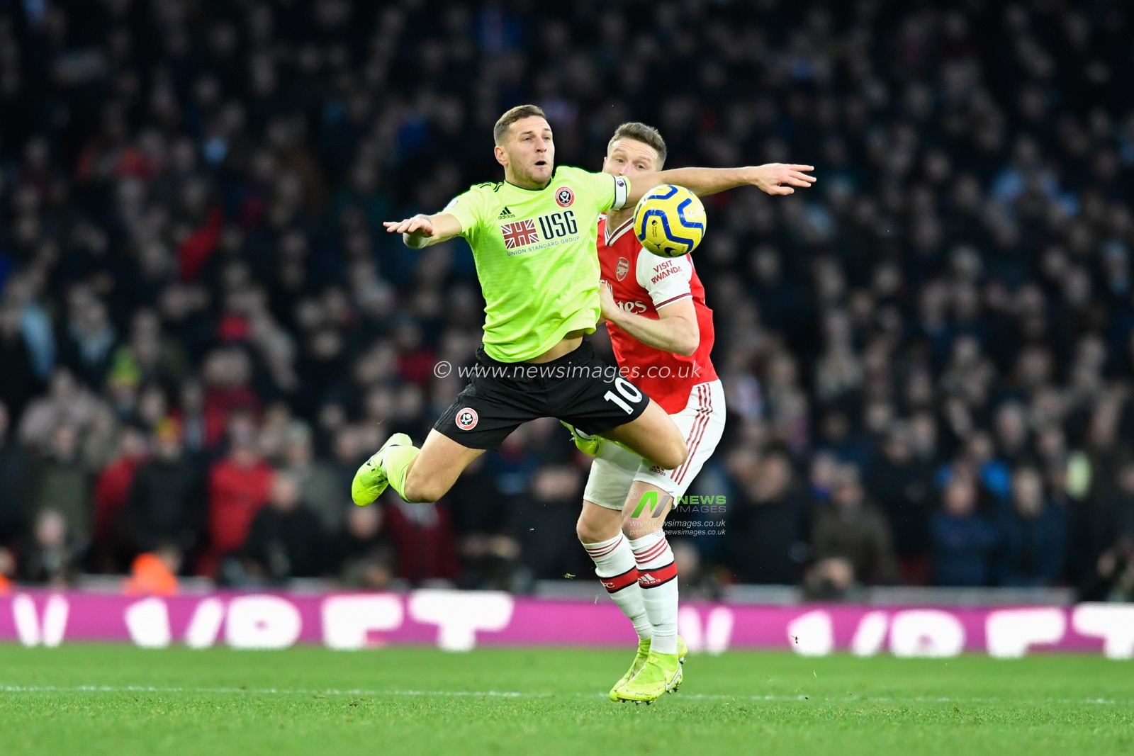18th January 2020, Emirates Stadium, London, England; Premier League, Arsenal v Sheffield United : Billy Sharp (10) of Sheffield United flying through the air as Shkodran Mustafi (20) of Arsenal gives away a foul

Credit: Simon Whitehead/News Images