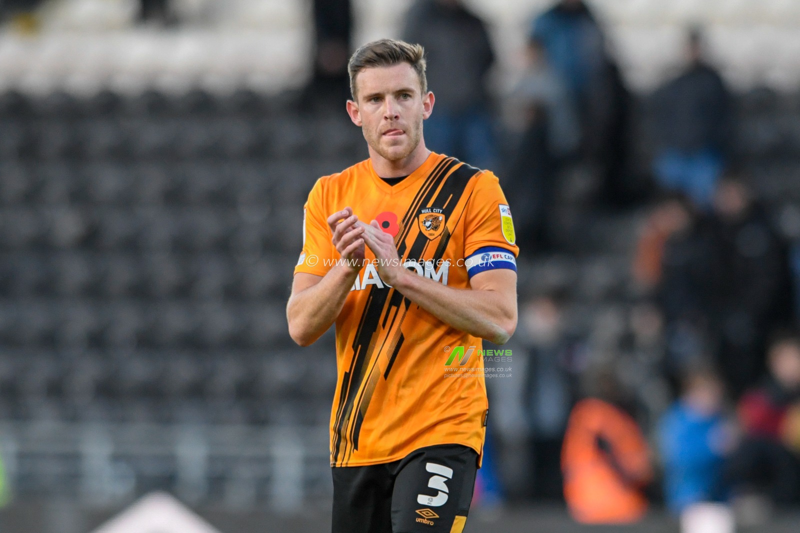 Callum Elder #3 of Hull City applauds the home supporters at the end of the game after his side lost 0-1 to Coventry City