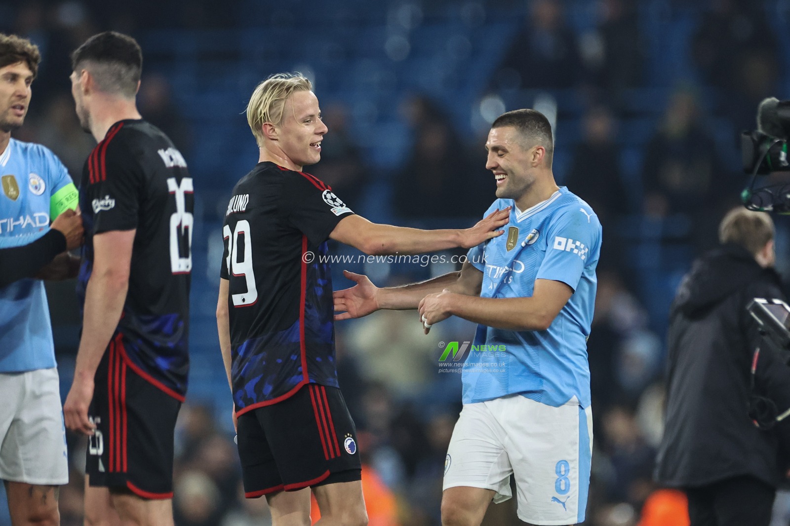 Oscar HÃ¸jlund of FC Copenhagen and Mateo KovaÄiÄ‡ of Manchester City after the game during the UEFA Champions League match Manchester City vs F.C. Copenhagen at Etihad Stadium, Manchester, United Kingdom, 6th March 2024

(Photo by Mark Cosgrove/News Images)