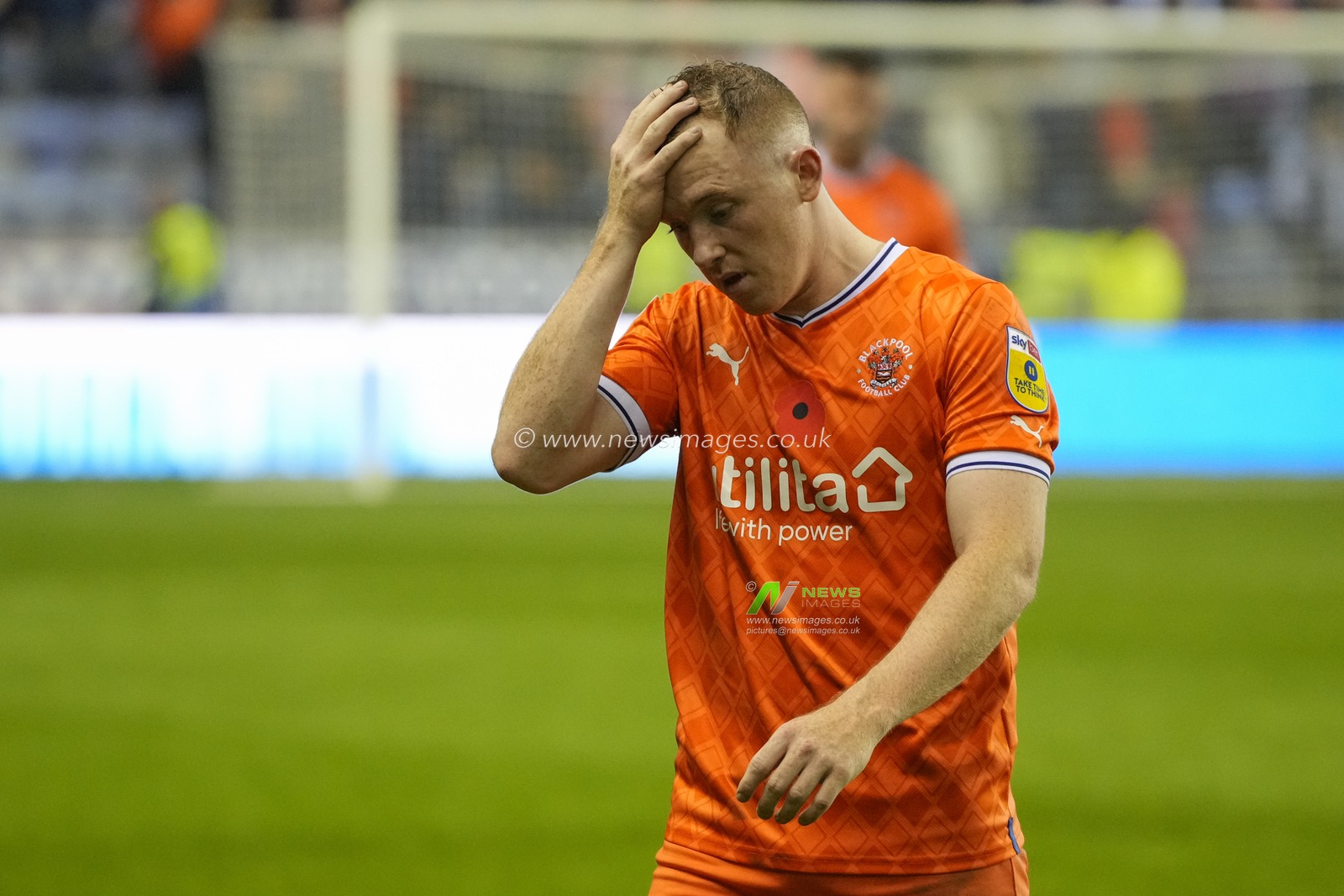 A dejected Shayne Lavery of Blackpool leaves the pitch after the Sky Bet Championship match Wigan Athletic vs Blackpool at DW Stadium, Wigan, United Kingdom, 12th November 2022

(Photo by Steve Flynn/News Images)