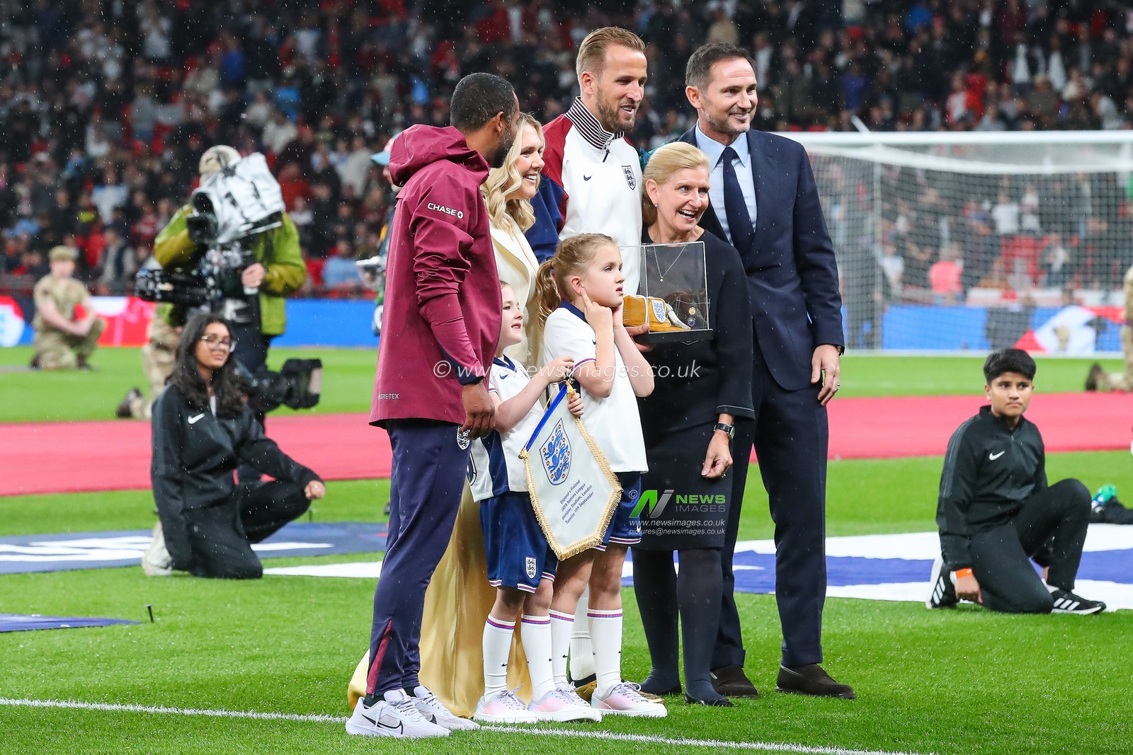 Harry Kane of England receives his golden cap for his 100th appearance for England in tonights  UEFA Nations League - League B - Group 2 England v Finland at Wembley Stadium, London, United Kingdom, 10th September 2024

(Photo by Gareth Evans/News Images)