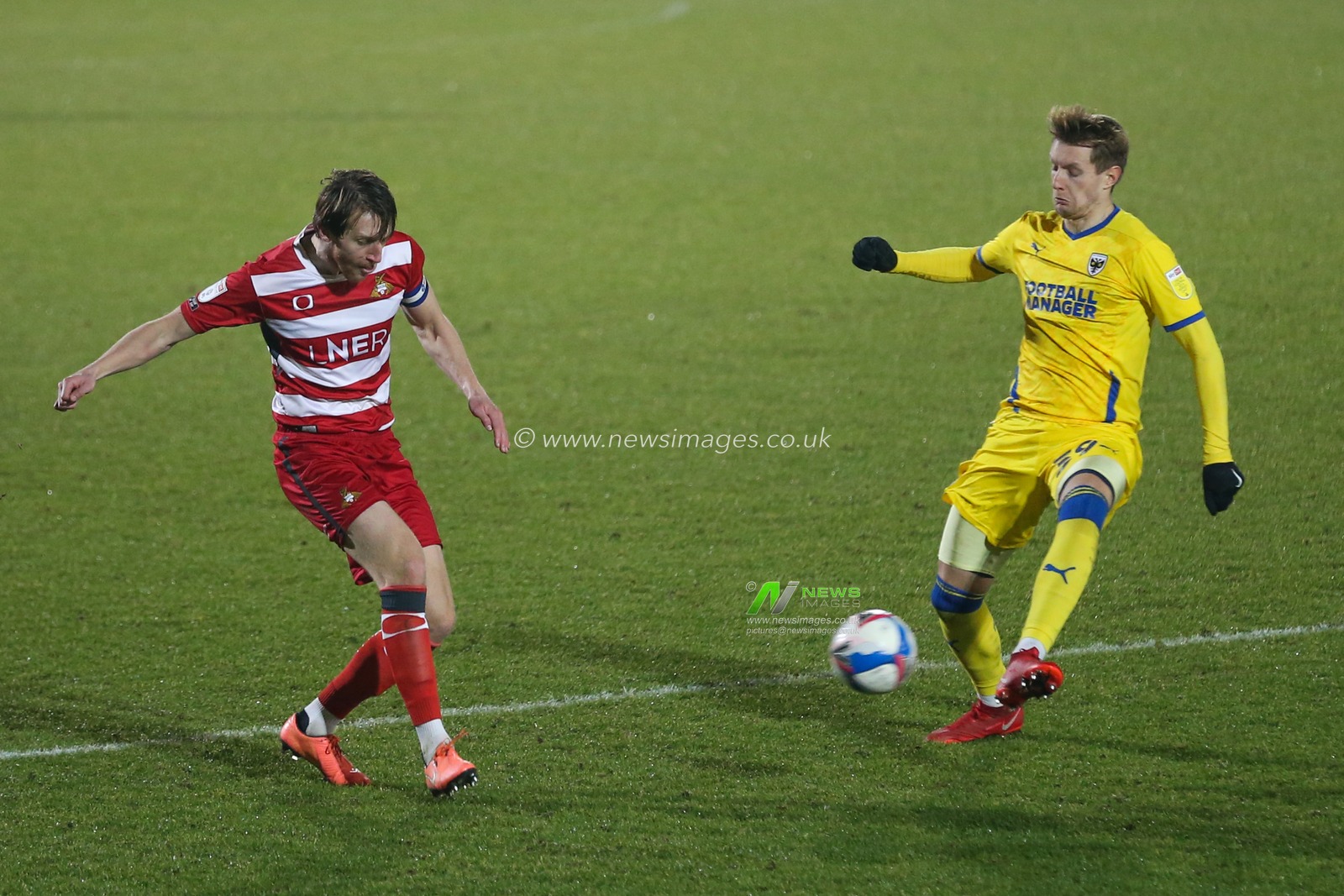 Tom Anderson #4 of Doncaster Rovers in action during the game