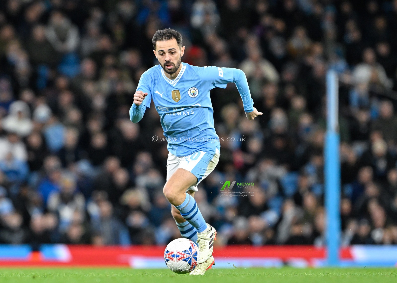 Bernardo Silva of Manchester City breaks forward with the ball, during the Emirates FA Cup Quarter- Final match Manchester City vs Newcastle United at Etihad Stadium, Manchester, United Kingdom, 16th March 2024

(Photo by Cody Froggatt/News Images)