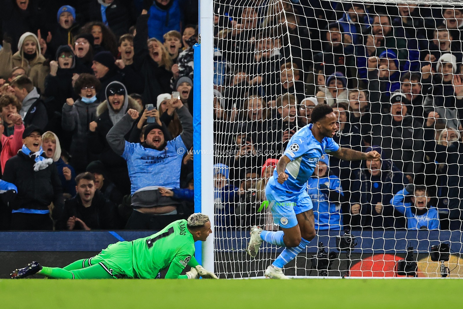 Raheem Sterling #7 of Manchester City celebrates his goal to make it 1-1