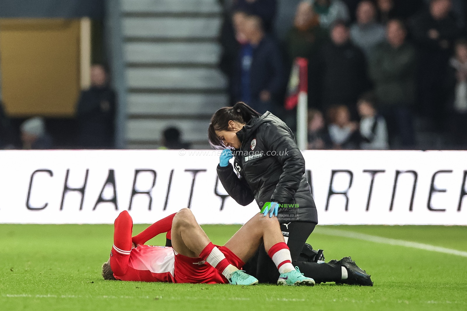 Josh Benson #10 of Barnsley receives treatment during the Sky Bet League 1 match Derby County vs Barnsley at Pride Park Stadium, Derby, United Kingdom, 11th November 2023

(Photo by Mark Cosgrove/News Images)
