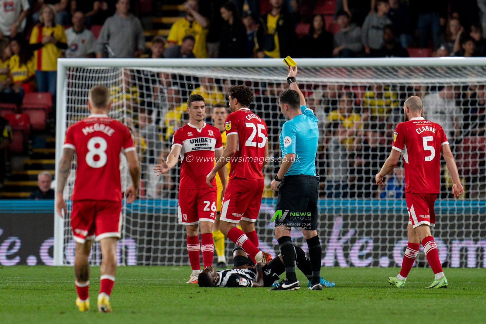 Matt Crooks #25 of Middlesbrough receives a yellow card