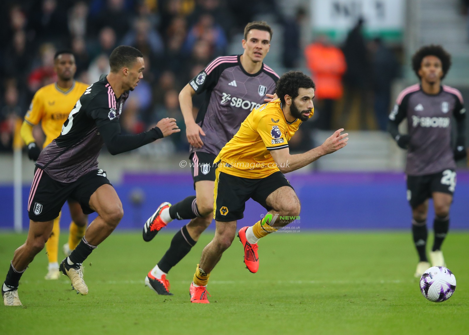 Rayan AÃ¯t-Nouri of Wolverhampton Wanderers breaks forward with the ball, during the Premier League match Wolverhampton Wanderers vs Fulham at Molineux, Wolverhampton, United Kingdom, 9th March 2024

(Photo by Gareth Evans/News Images)