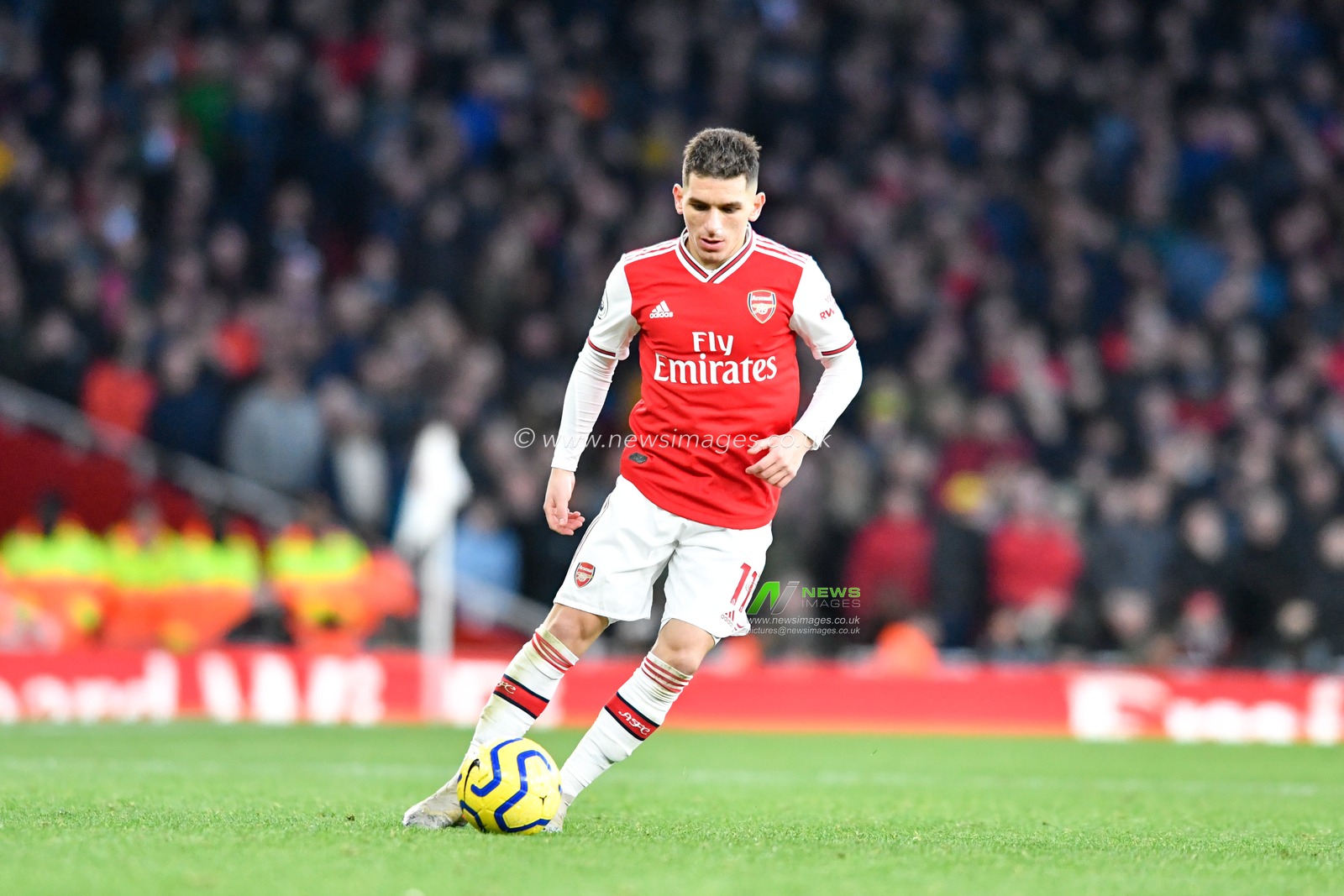 18th January 2020, Emirates Stadium, London, England; Premier League, Arsenal v Sheffield United : Lucas Torreira (11) of Arsenal with the ball at his feet

Credit: Simon Whitehead/News Images