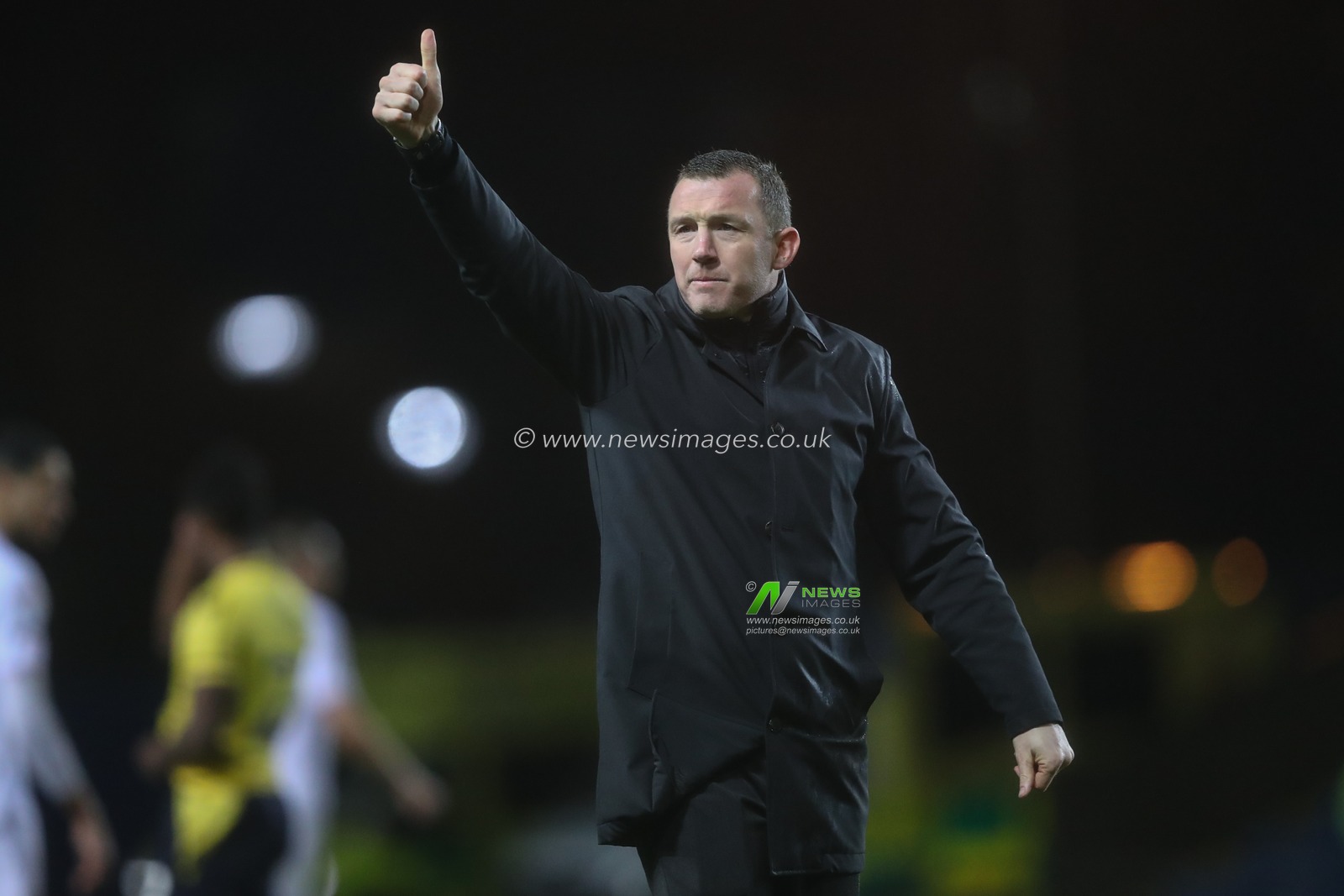 Neill Collins Head coach of Barnsley gives the travelling fans a thumbs up during the Sky Bet League 1 match Oxford United vs Barnsley at Kassam Stadium, Oxford, United Kingdom, 23rd January 2024

(Photo by Alfie Cosgrove/News Images)