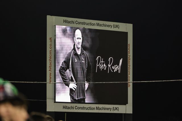 Players officials and fans hold a minutes applause as they remember former Newcastle head coach Peter Russell during the Gallagher Premiership match Newcastle Red Bulls vs Northampton Saints at Kingston Park, Newcastle, United Kingdom, 17th October 2025

(Photo by Mark Cosgrove/News Images)