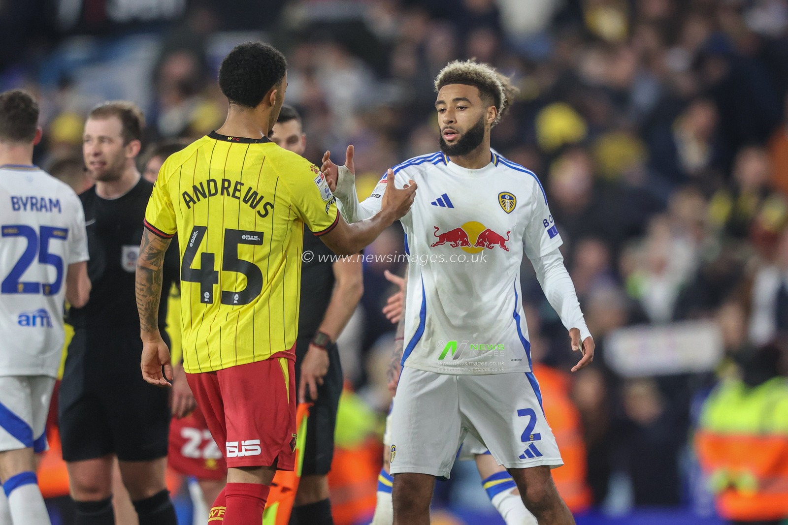 Ryan Andrews of Watford shakes hands with Jayden Bogle of Leeds United during the Sky Bet Championship match Leeds United vs Watford at Elland Road, Leeds, United Kingdom, 22nd October 2024

(Photo by Alfie Cosgrove/News Images)