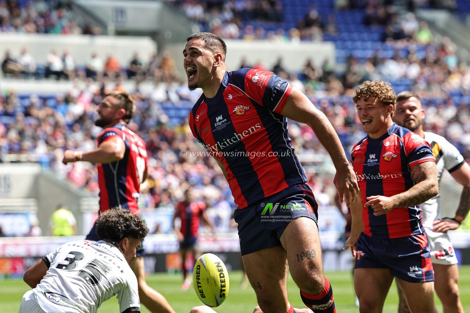Caleb Hamlin-Uele of Wakefield Trinity celebrates his try during the Betfred Super League Magic Weekend match Wakefield Trinity vs Castleford Tigers at Hill Dickinson Stadium, Liverpool, United Kingdom on 05 July 2026

(Photo by Mark Cosgrove/News Images)