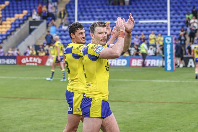Sam Stone of Warrington Wolves and Lachlan Fitzgibbon of Warrington Wolves applauds the fans after the game during the Betfred Super League round 16 match Warrington Wolves vs Hull FC at Halliwell Jones Stadium, Warrington, United Kingdom, 28th June 2025

(Photo by Alfie Cosgrove/News Images)
