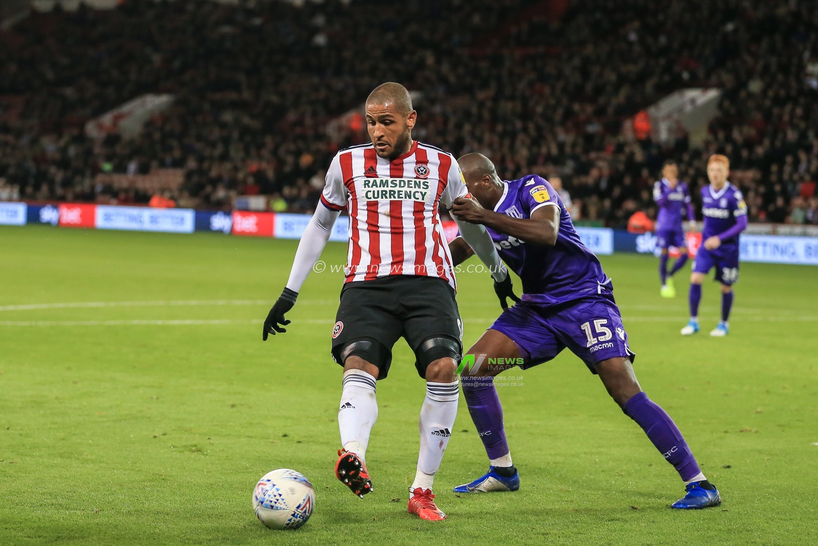 23rd October 2018, Bramall Lane, Sheffield, England; Sky Bet Championship, Sheffield United v Stoke City ; Leon Clarke (09) of Sheffield United  holds off Bruno Martins Indi (15) of Stoke City


Credit: Mark Cosgrove/News Images

English Football League images are subject to DataCo Licence