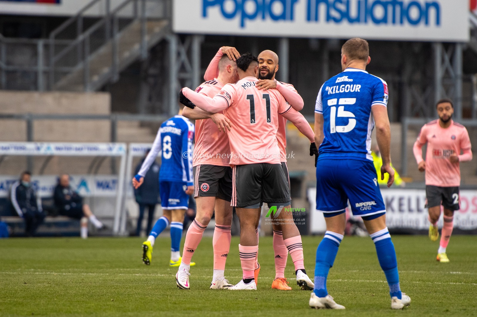 Sheffield Utd players celebrate the goal with Lys Mousset #11 of Sheffield United