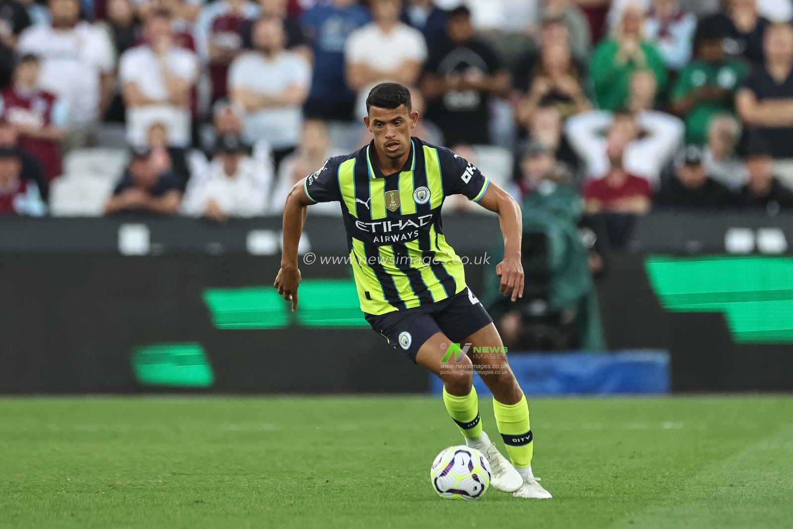 Matheus Nunes of Manchester City with the ball during the Premier League match West Ham United vs Manchester City at London Stadium, London, United Kingdom, 31st August 2024

(Photo by Mark Cosgrove/News Images)