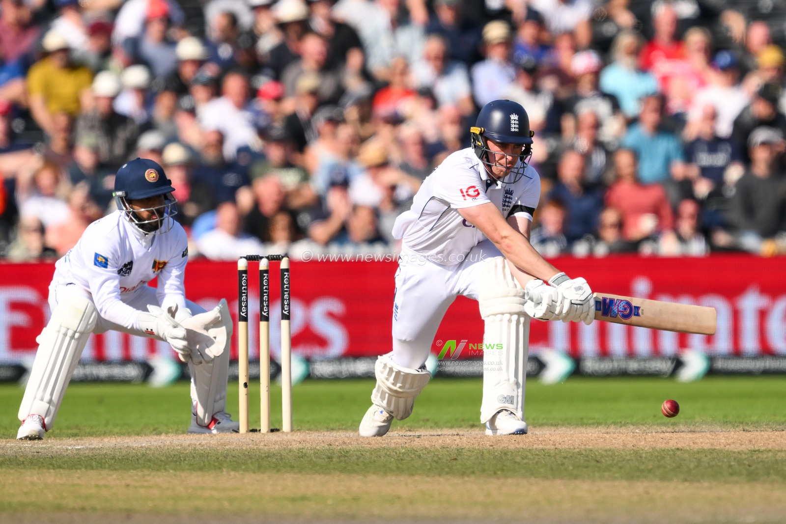 Dan Lawrence of England reverse sweeps the ball for a single during the England Men v Sri Lanka 1st Rothesay Test Match Day 4 at Old Trafford, Manchester, United Kingdom, 24th August 2024

(Photo by Craig Thomas/News Images)