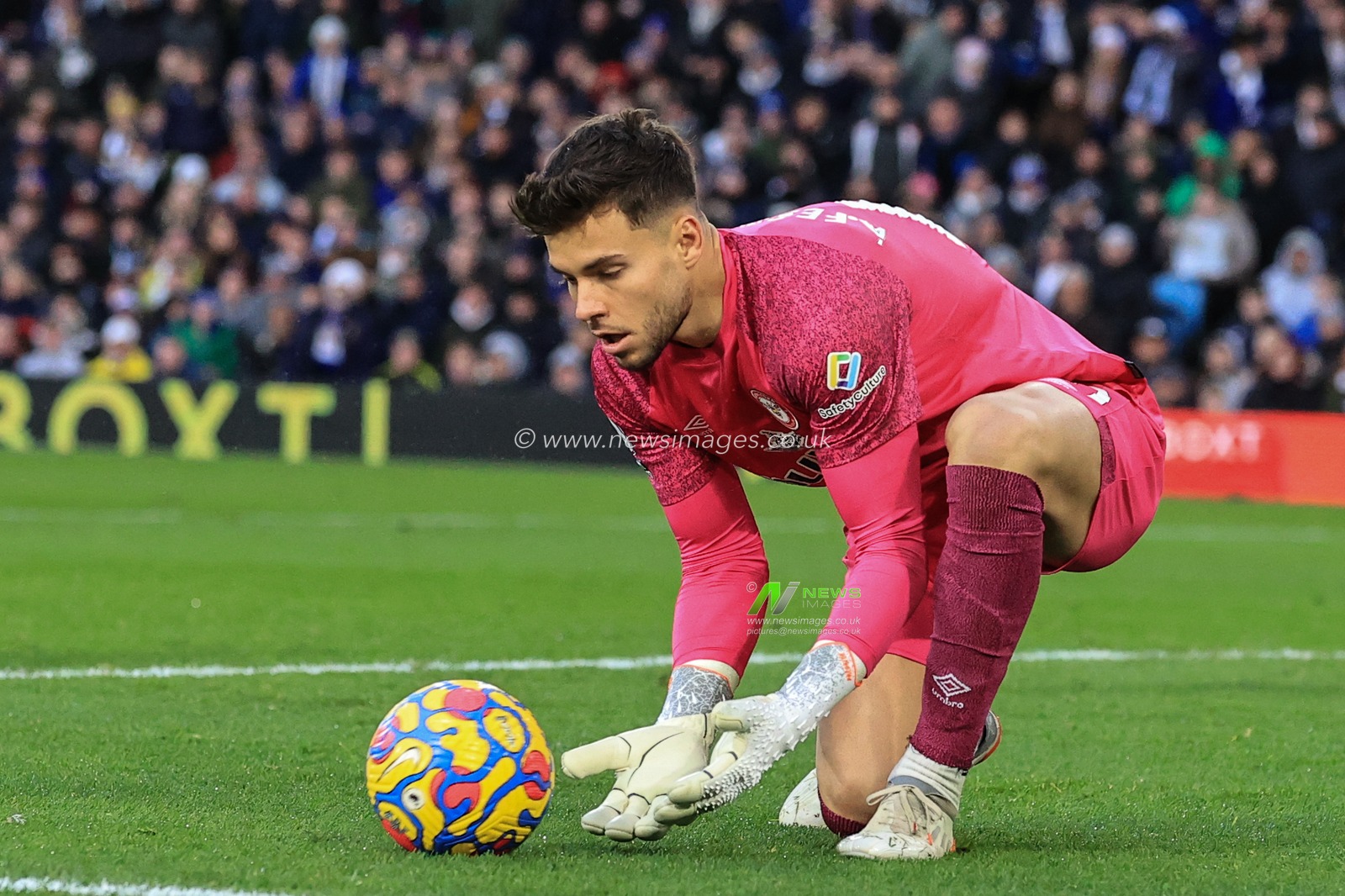 Ãlvaro Fernandez #40 of Brentford collects the ball