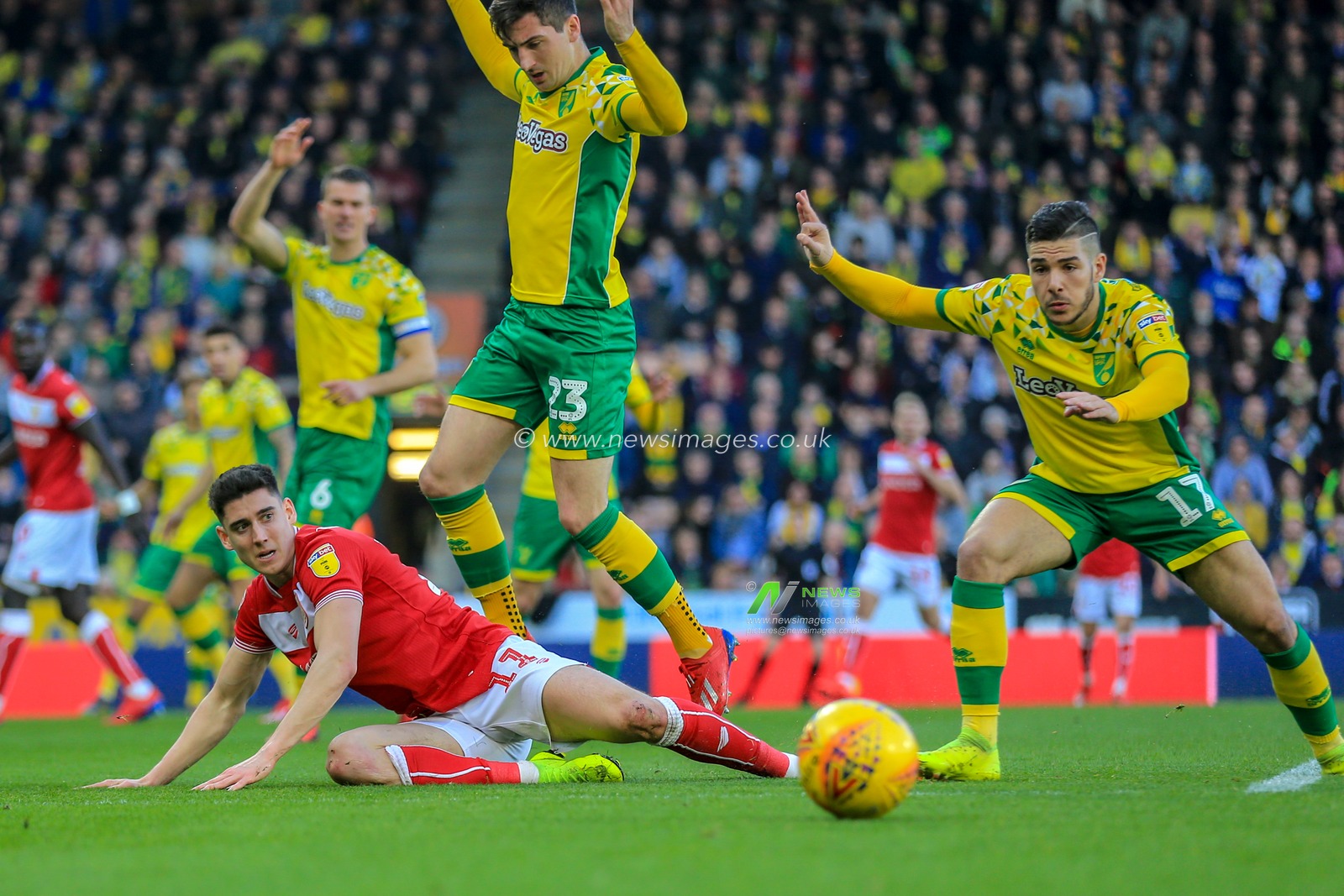 23rd February 2019, Carrow Road, Norfolk, England; Sky Bet Championship, Norwich City vs Bristol City ;  Callum O'Dowda (11) of Bristol City is tackled by Emiliano Buendia (17) of Norwich City

Credit: Georgie Kerr/News Images

English Football League images are subject to DataCo Licence