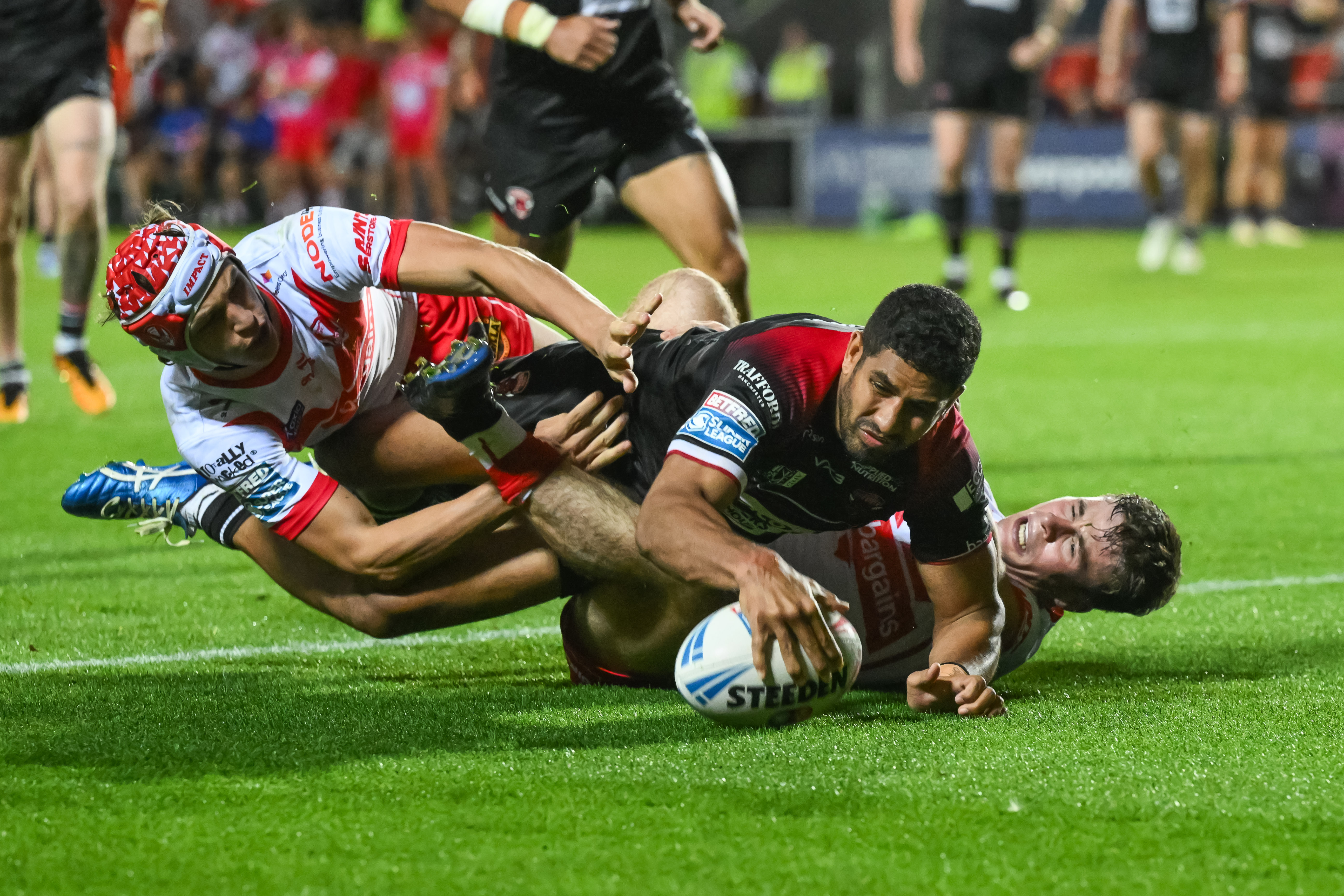 Nene Macdonald of Salford Red Devils goes over for a try during the Betfred Super League Round 21 match St Helens vs Salford Red Devils at Totally Wicked Stadium, St Helens, United Kingdom, 8th August 2024  (Photo by Craig Thomas/News Images)