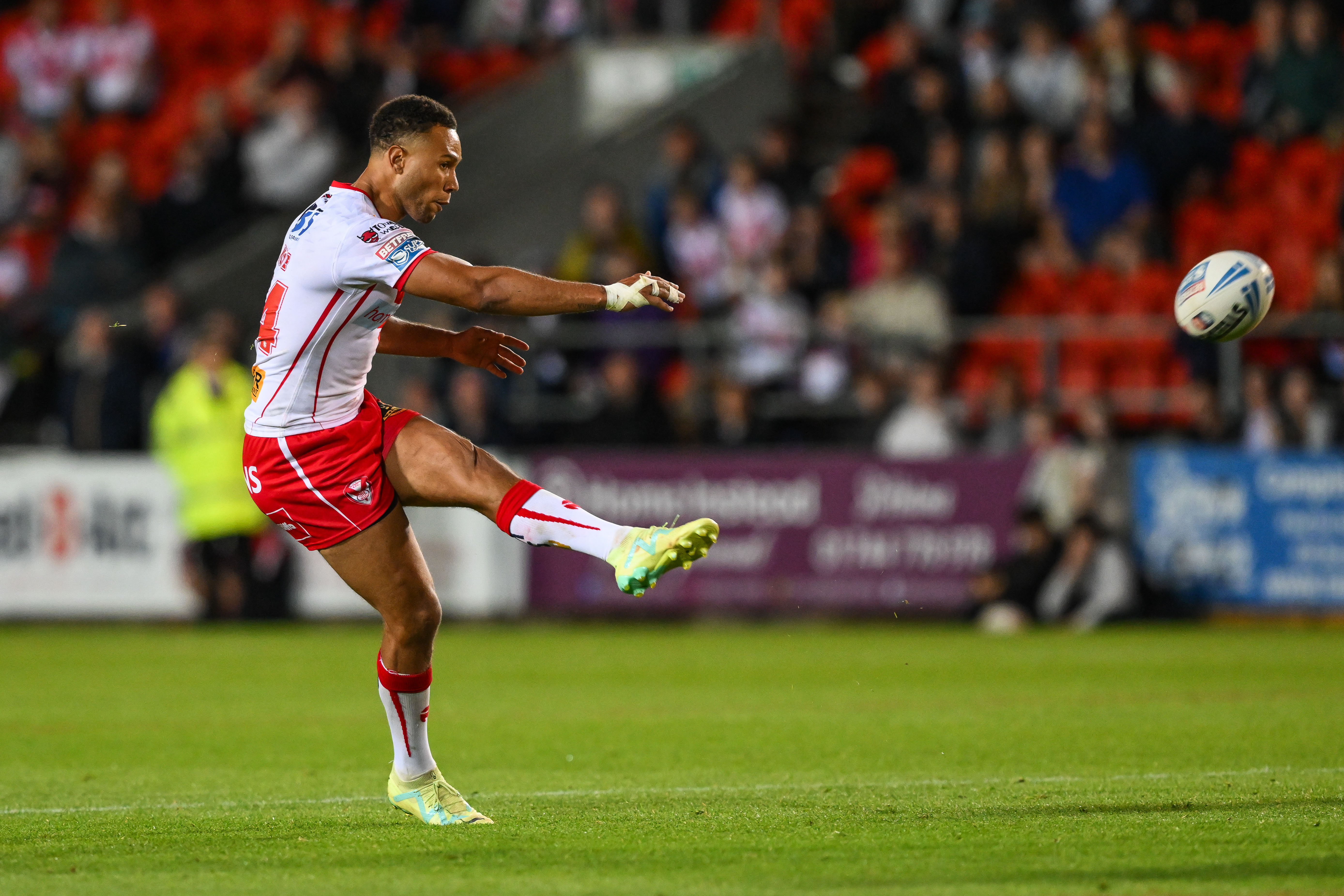 Moses Mbye of St. Helens drops a goal in golden point extra time to win the game to win the Betfred Super League Round 21 match St Helens vs Salford Red Devils at Totally Wicked Stadium, St Helens, United Kingdom, 8th August 2024  (Photo by Craig Thomas/News Images)