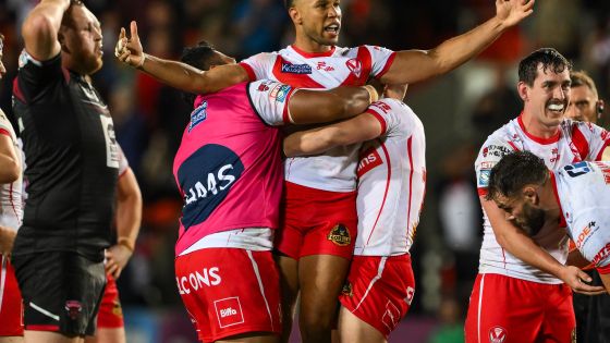 Moses Mbye of St. Helens celebrates his drop goal in extra time to win Betfred Super League Round 21 match St Helens vs Salford Red Devils at Totally Wicked Stadium, St Helens, United Kingdom, 8th August 2024  (Photo by Craig Thomas/News Images)