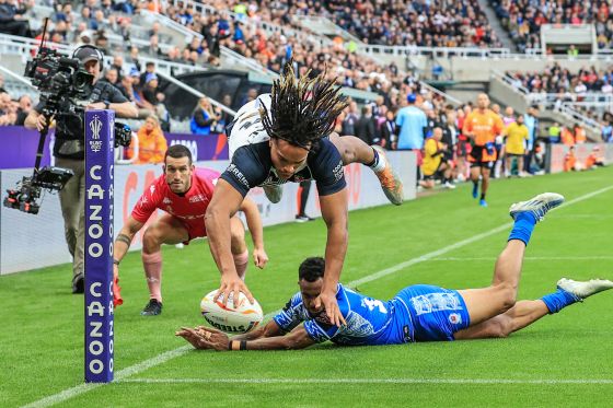 Dom Young of England goes over for a tryduring the Rugby League World Cup