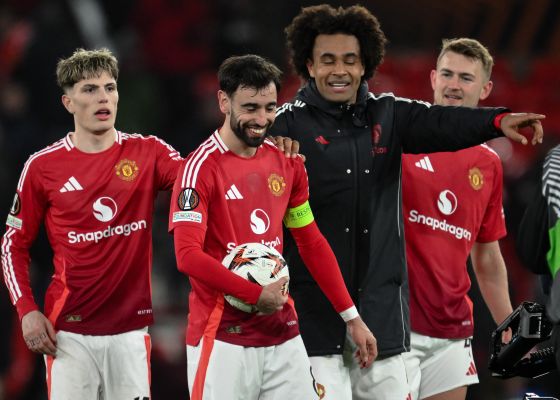 Bruno Fernandes of Manchester United collects the match ball after scoring a hat-trick during the UEFA Europa League Last 16 match Manchester United vs Real Sociedad at Old Trafford, Manchester, United Kingdom, 13th March 2025  (Photo by Craig Thomas/News Images)